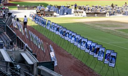 honoree photos lined up at induction ceremony