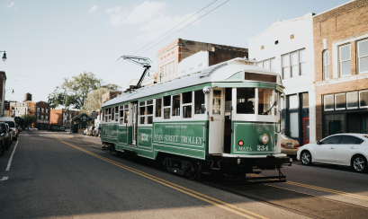green trolley going down south main