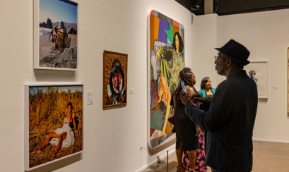 Guests browsing an art exhibit at the Memphis Brooks Museum of Art.