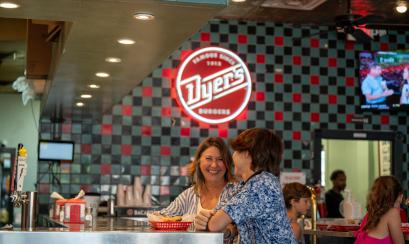 mom and son sitting at counter at dyers