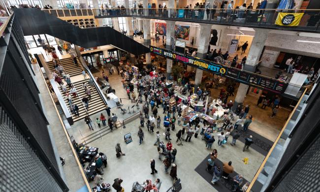 aerial look inside crosstown concourse during crafts &amp; drafts holiday market