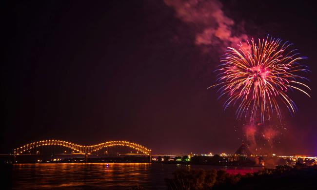 hernando desoto bridge with fireworks