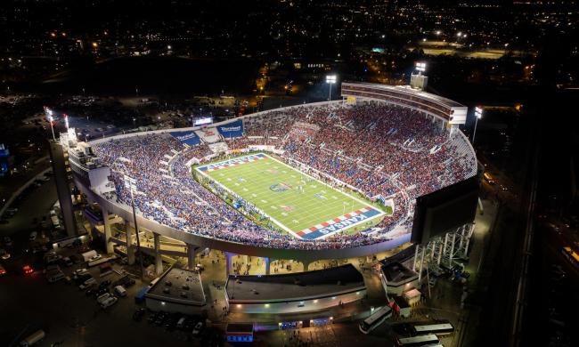 An aerial view of Simmons Bank Liberty Stadium filled with fans during a Memphis Tigers football game.