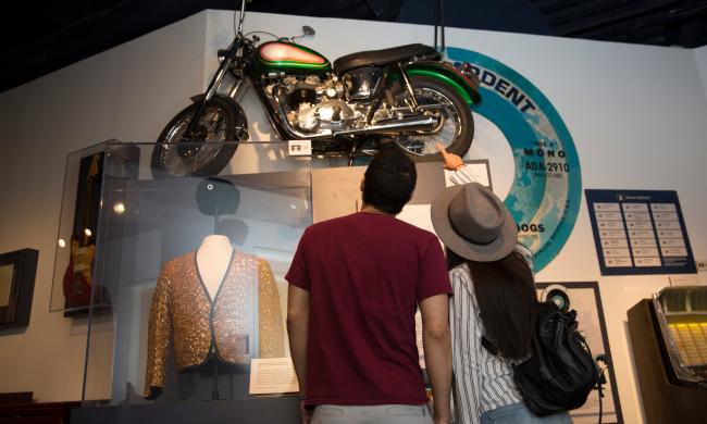Visitors peruse the exhibits at the Memphis Music Hall of Fame.