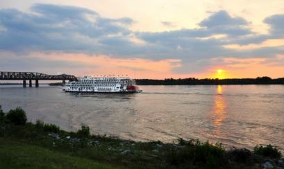 Sunset behind the American Queen riverboat on the Mississippi River