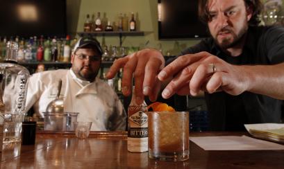 Bartender serving drinks at a restaurant in Memphis