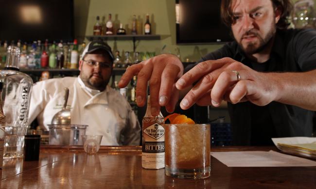 Bartender serving drinks at a restaurant in Memphis