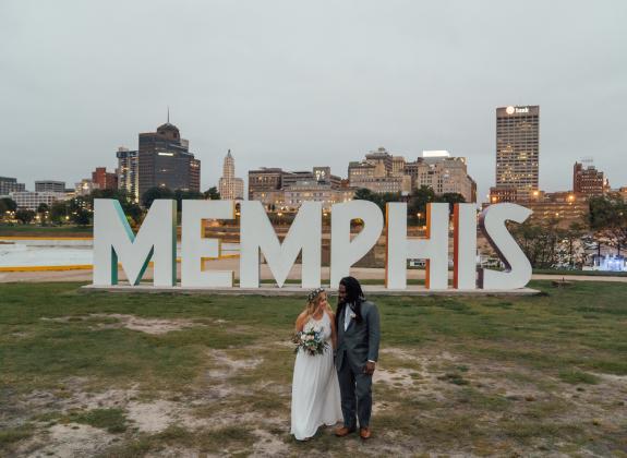 Bride and groom with the Mud Island River Park Memphis mural