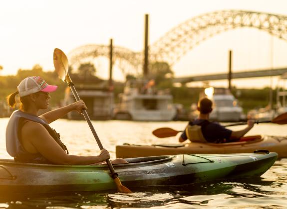 couple kayaks together on Mississippi River