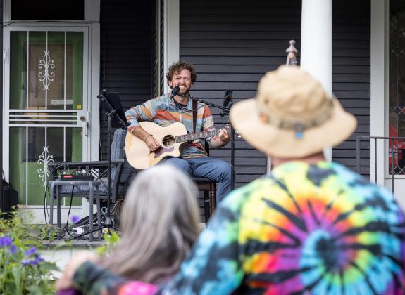 Couple watching porchfest singer