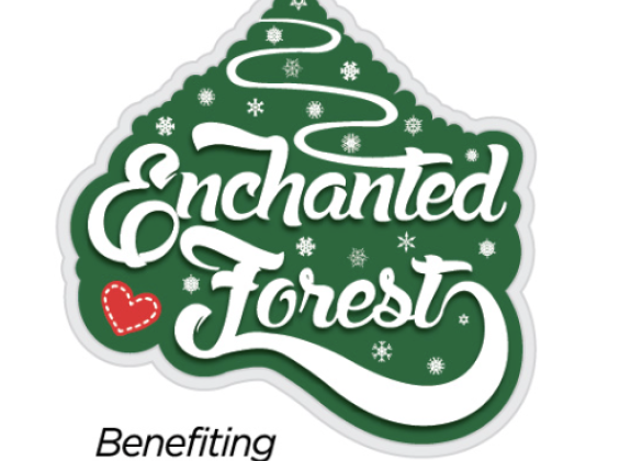 green tree with white lettering inside that says "Enchanted Forest" in Cursive Writing