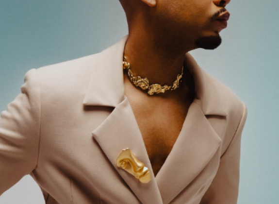 african american man in a suit looking over his shoulder