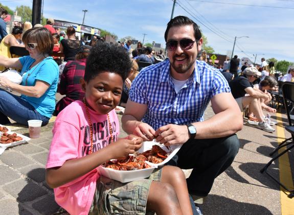 People sharing crawfish at the crawfish festival memphis