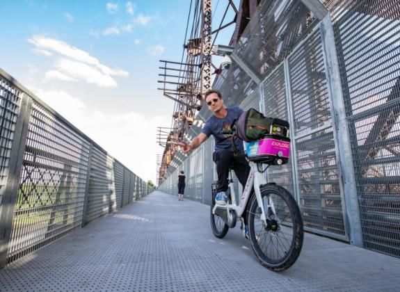 Bikers on Big River Crossing Pedestrian Bridge Photo