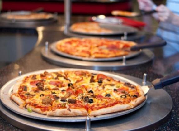 Fresh pizza, pasta, salads and more at America's Incredible Pizza. Photo by Susan Fischer. Photo 2