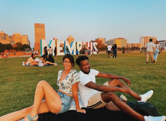 Friends hanging out at Mud Island by the MEMPHIS sign. Photo