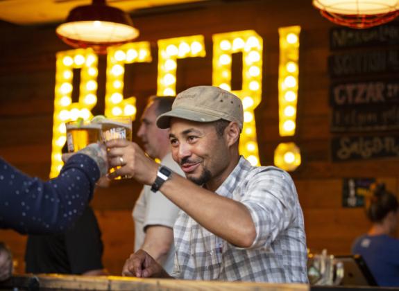 Cheers at High Cotton Brewery. Photo: Craig Thompson Photo