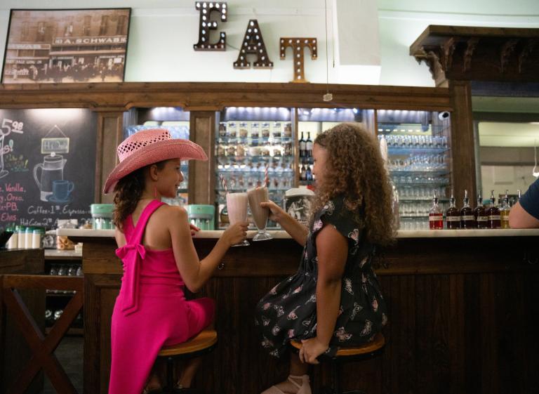 Kids exploring A. Schwab Photo 4