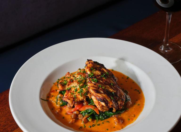 Harissa Chicken and Wine - The Majestic Grille Photo 3