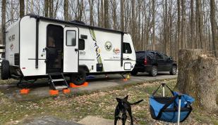 A rental RV from Rock N Roll Rentals set up at Meeman-Shelby Forest State Park | Rock N Roll Rentals