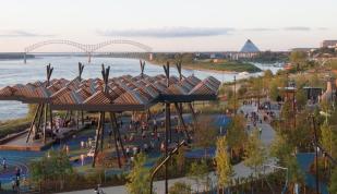 Tom Lee Park from above overlooking the playground, sunset canopy and the Mississippi River at dusk