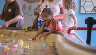 girl fishing Children's museum