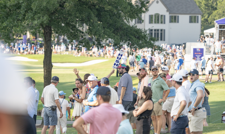 Spectators line the golf course at the FedEx St. Jude Championship.