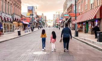 Family strolling Beale Street