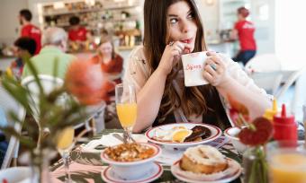 girl at brunch at liquor store