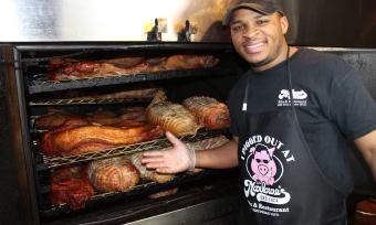 Pitmaster in front of the pit at Marlowe's Ribs & Restaurant. 
