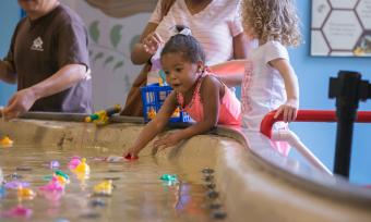 girl fishing Children's museum 