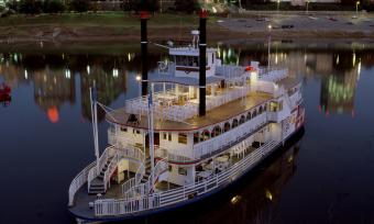 A Memphis Queen riverboat floats on the Mississippi River.